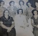 Matriarca e pioneira de Quatro Pontes, Emilia Lang, e suas noras. 
Da esquerda a direita,  ao fundo, em pé: Carlota Stenzel, esposa de Lauro Lang; Maria Rauber, esposa de Otmar Lang; Ana Julita Kist, esposa de Arno Nicolau Lang (primeiro morador de Quatro Pontes junto com o irmão Seno José Lang); Leonora Langer, esposa de Bruno Lang;  e Irene Konzen, esposa de Waldomiro Lang. 
Sentadas: matriarca Emilia (nascida Mallmann) Lang; Maria Siloca Jones, noiva de Wilmar Roque Lang; e Margarida Justen, esposa de Seno José Lang (primeiro morador de Quatro Pontes junto com o irmão Arno Nicolau Lang. 