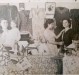 No colo da mãe Frida Joana durante um curso de corte e costura.