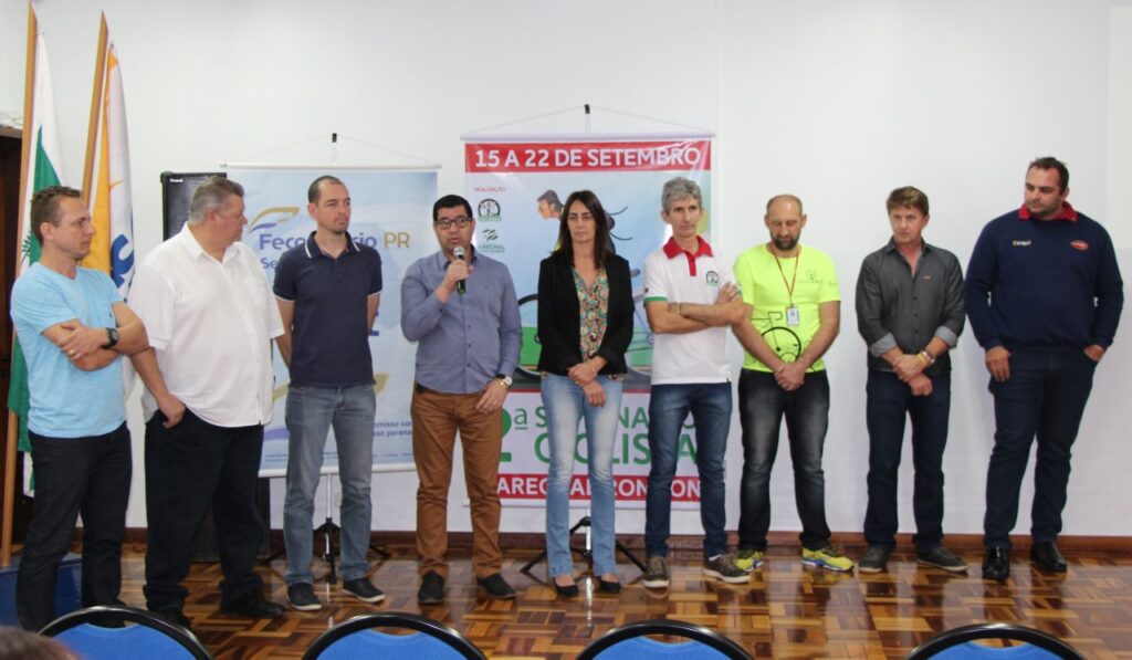 || Solenidade de lançamento da 2ª Semana do Ciclista de Marechal Cândido Rondon, em agosto de 2018.
Da esquerda à direita: vereador Vanderlei Sauer; Sérgio Marcucci, secretário municipal de Indústria, Comércio e Turismo; Cristiano Metzner, secretário municipal de Esporte e Lazer; major Welington Alves da Rosa, secretário municipal de Mobilidade Urbana; professora Márcia Mota, secretária municipal de Educação; Paul Lirio Berwig, presidente da Associação Rondonense de Ciclismo (ARC);  João Alberto Züge, representante do SESC: vereador Nilson Hachmann e Scharles Abbeg, diretor de eventos da ARC. 
Imagem: Acervo Marechal News - FOTO 14 -