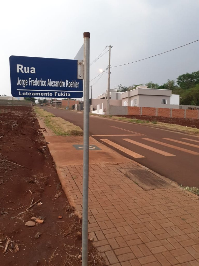 || Placa indicativa da rua em homenagem ao pioneiro rondonense Jorge Frederico Alexandre Koehler, na cidade de Marechal Cândido Rondon. 
Imagem: Acervo Nilson Hachmann - FOTO 3 -